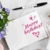 Charming birthday greeting card layout with macarons, flowers, and gift box., tags: ihr - pexel